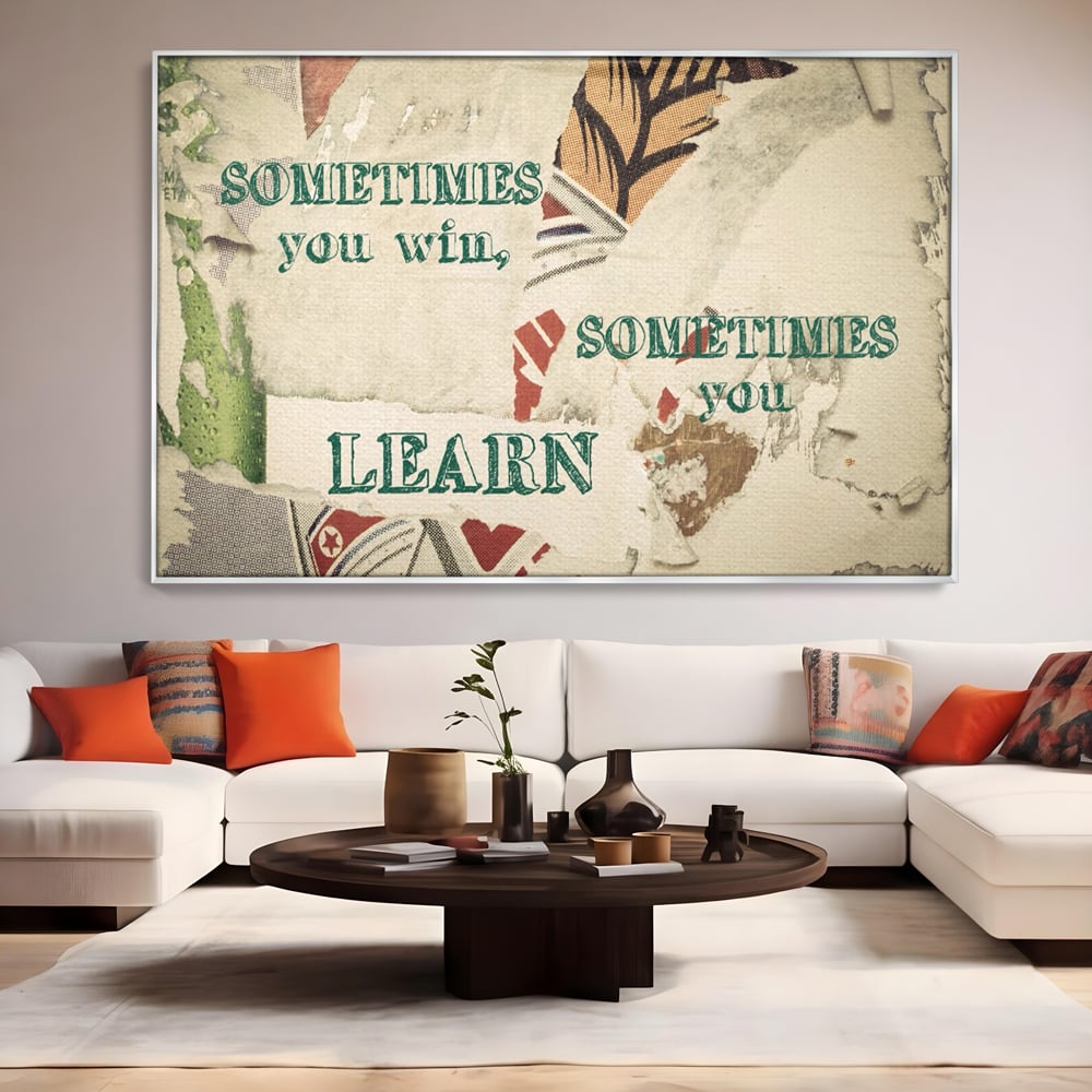 Tablou canvas cu tablou canvas cu mesaj motivational, in rama de aluminiu argintiu, pe perete intr-un living